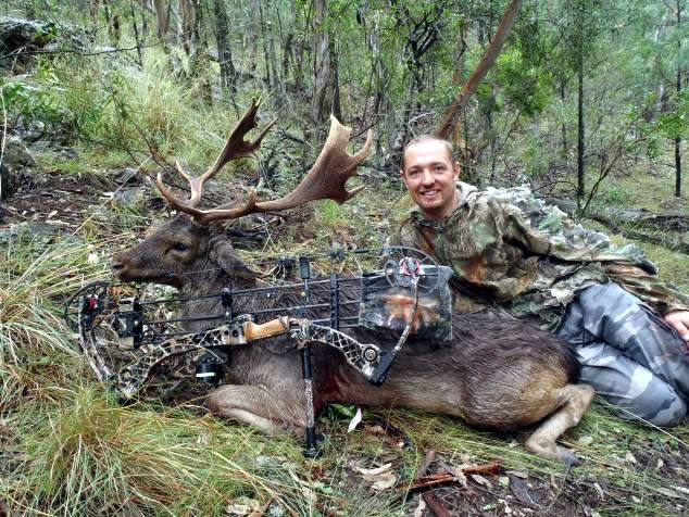 bowhunter pictured with a fallow deer taken at Jackals Hide.